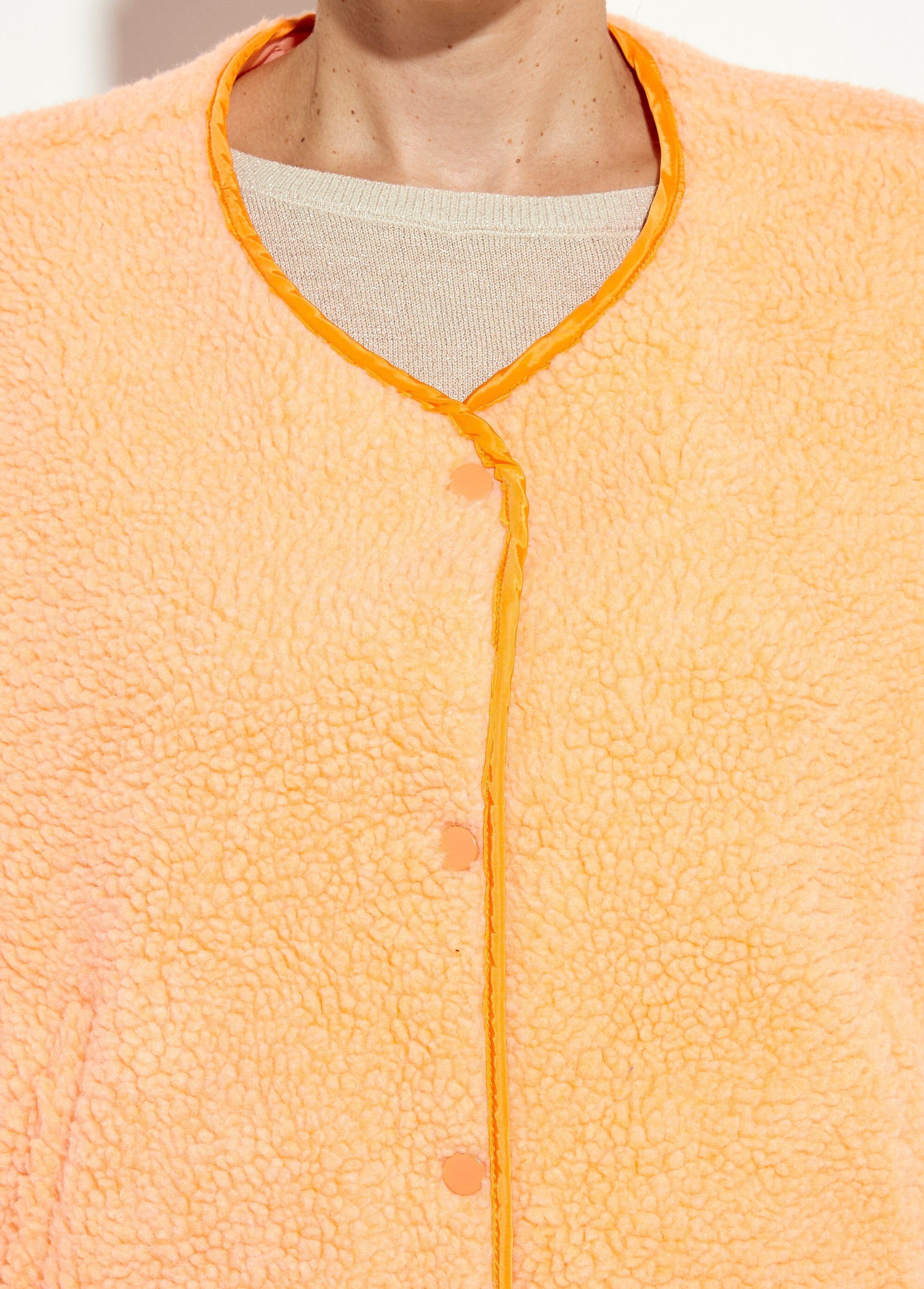 Sleeveless_vest,_fluorescent_faux_fur_Neon_orange_DE1_slim